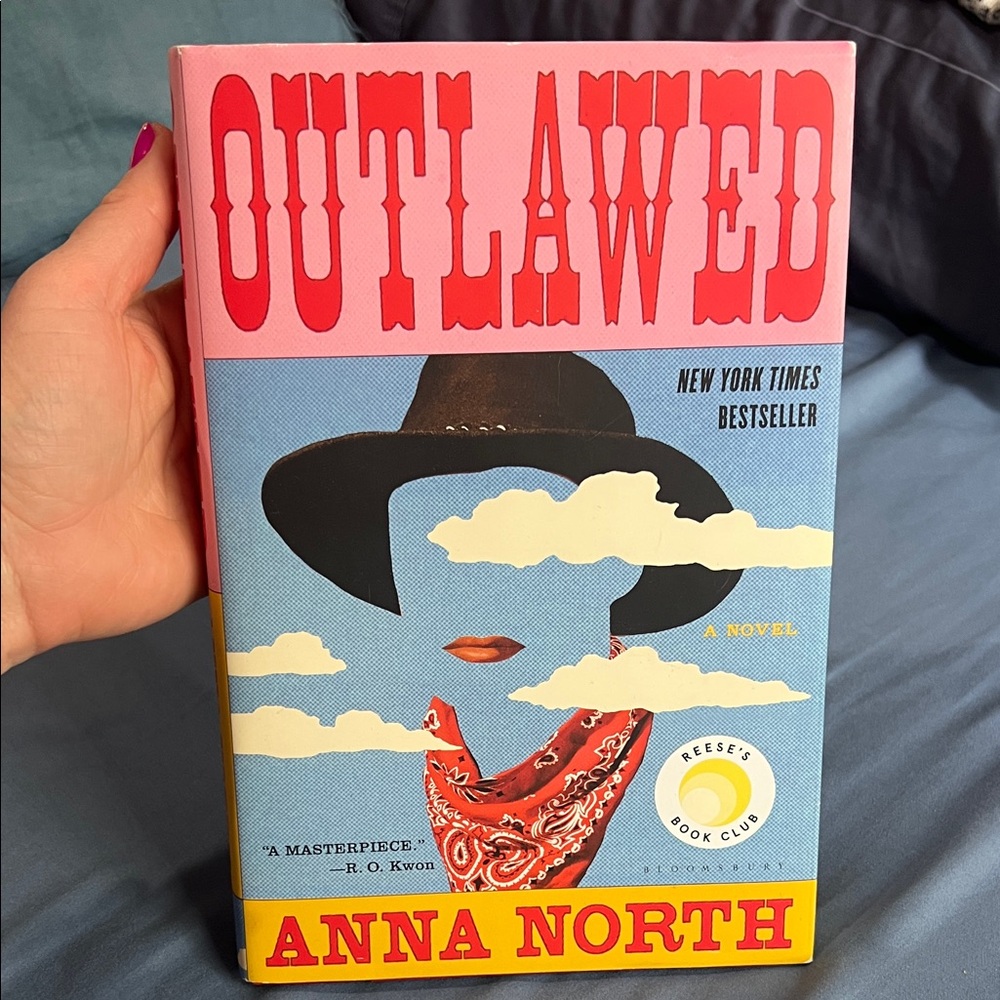 Outlawed by Anna North - Pink Blue Yellow Cover